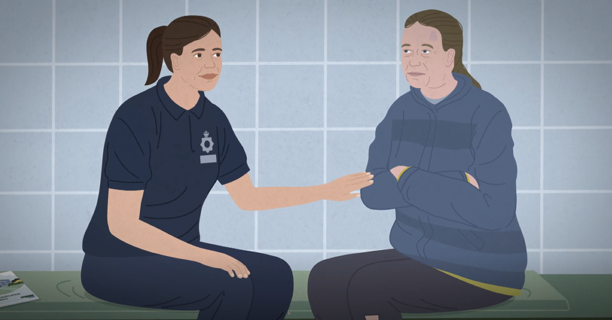 A support worker comforts