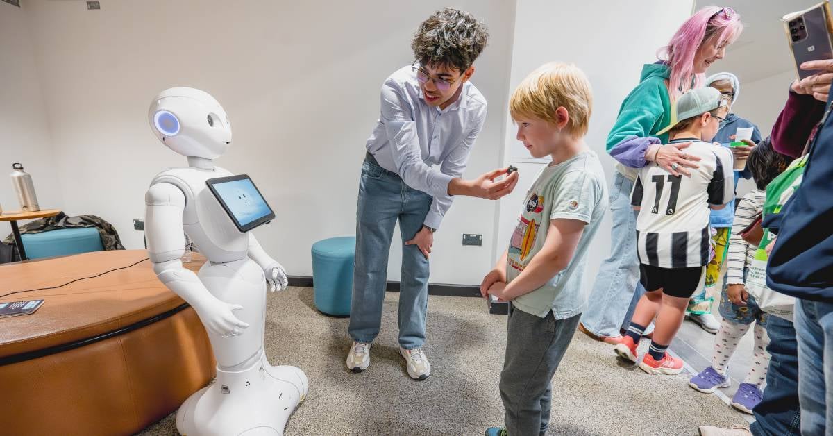Image shows Visitors could have a conversation with Pepper the robot, powered by AI.