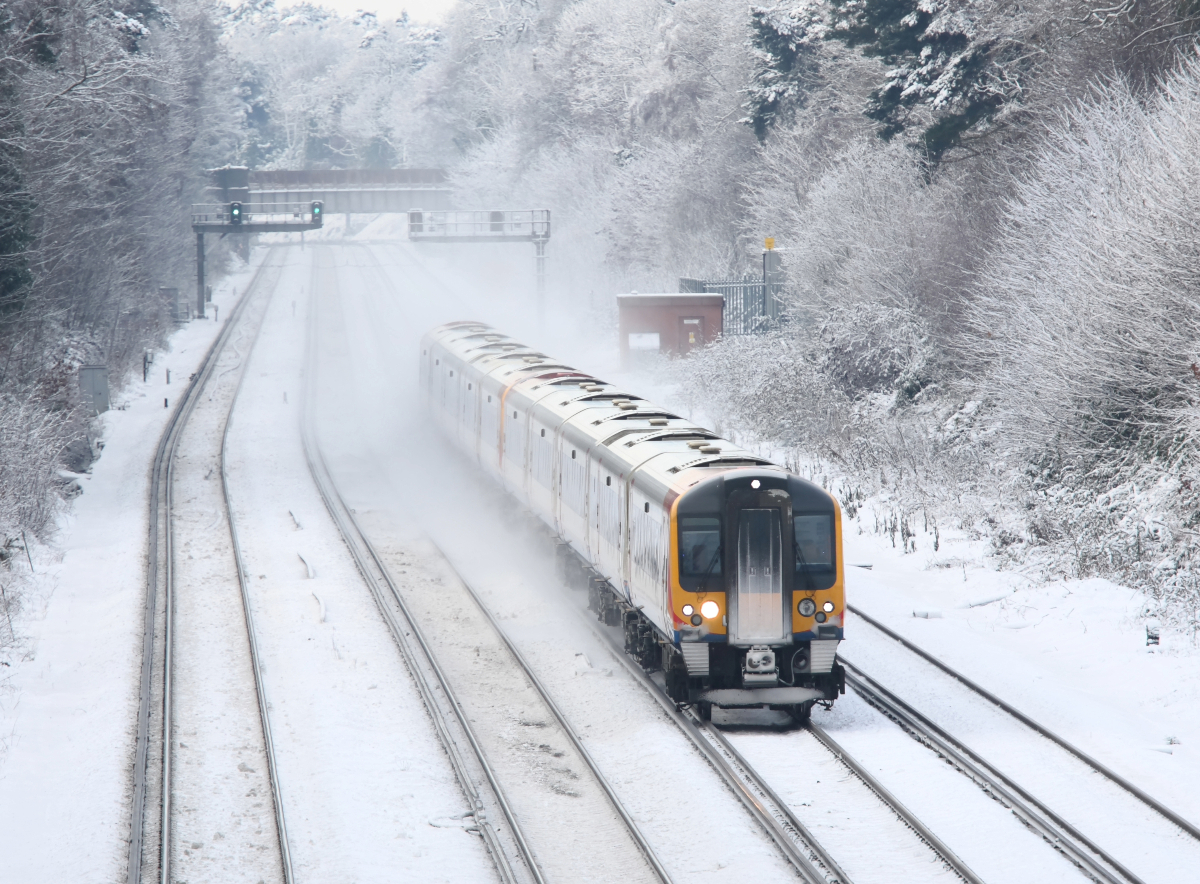 train moving on snowy tracks