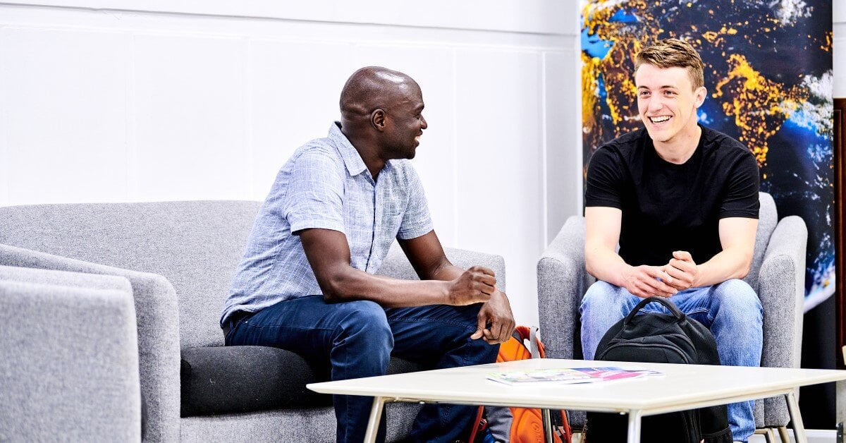 Two apprentices catch up during a study day