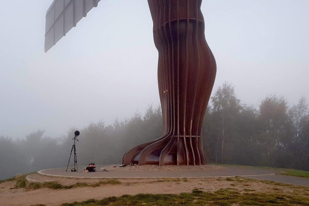 Angel of the North with recording equipment