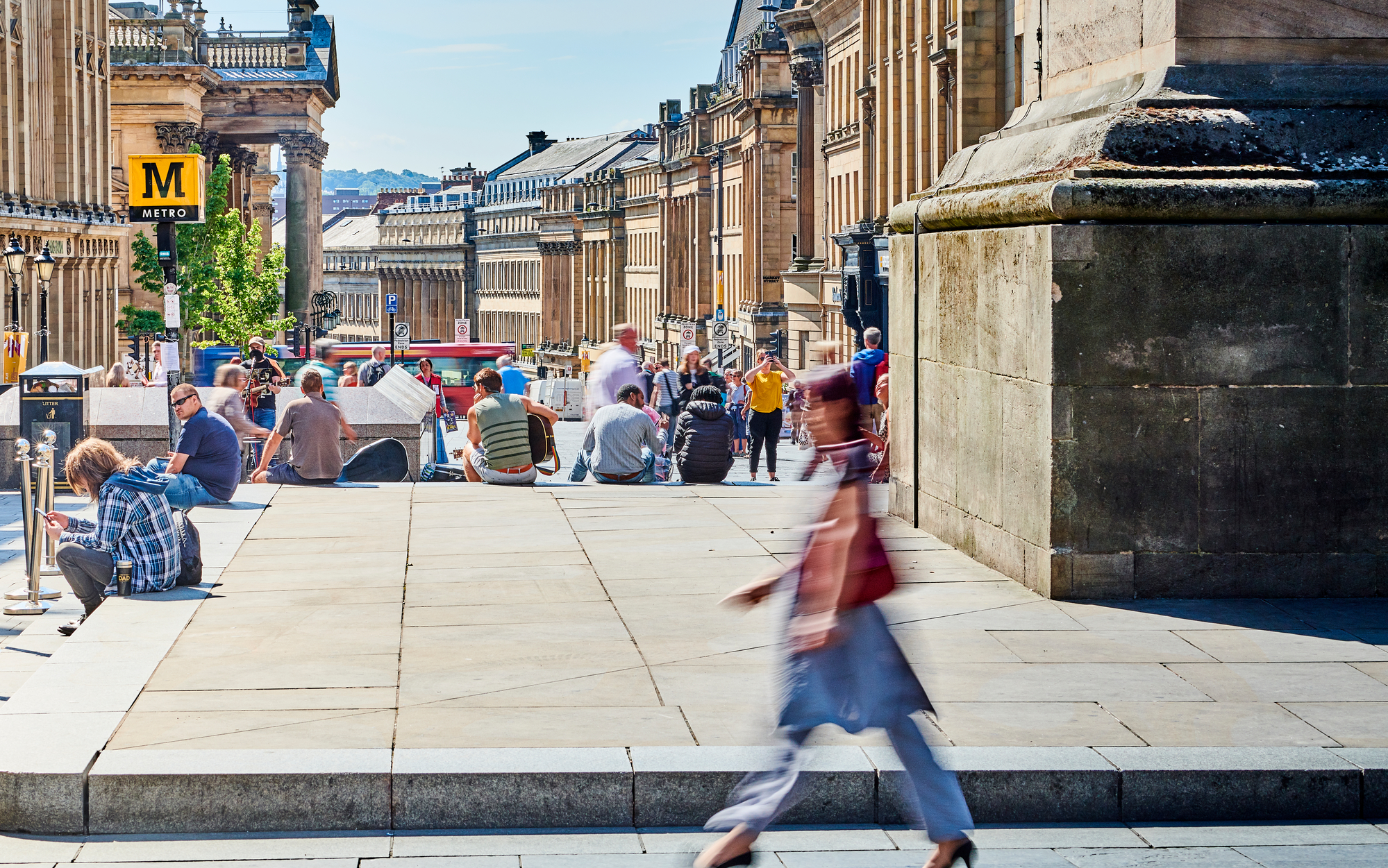 A woman walks through Newcastle city centre